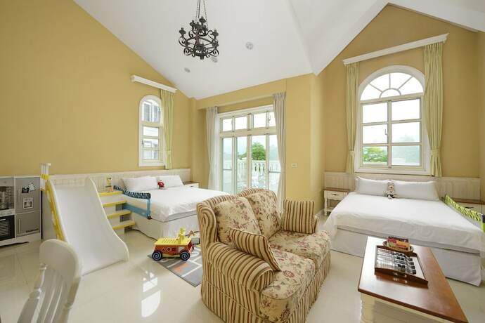 Imagen de la habitación del Hotel Dancing Butterfly Slide Family Inn. Foto 29