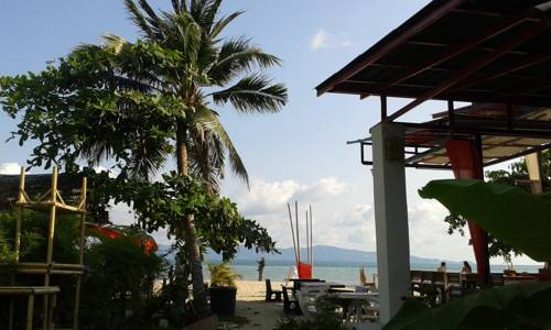Imagen de la habitación del Hotel Dancing Elephant Beach Club. Foto 9