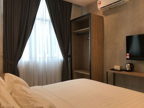 Imagen de la habitación del Hotel Dandelion Inn. Foto 14