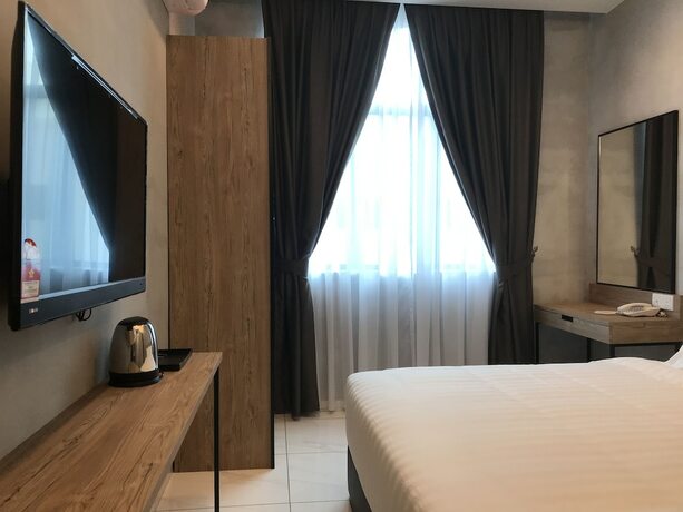 Imagen de la habitación del Hotel Dandelion Inn. Foto 16