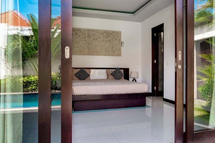 Imagen de la habitación del Hotel Dandg Villas. Foto 7