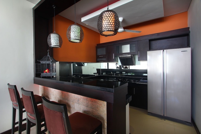 Imagen de la habitación del Hotel Dandg Villas. Foto 10