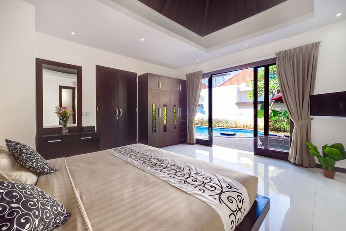 Imagen de la habitación del Hotel Dandg Villas. Foto 17