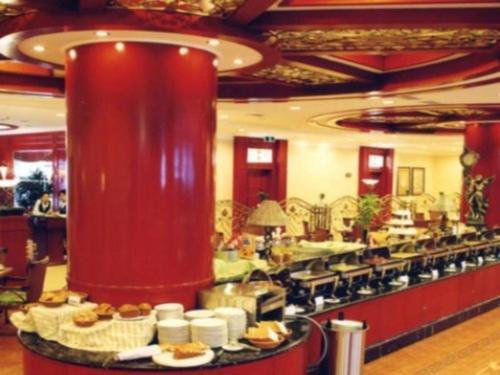 Imagen general del Hotel Dandong Rising Zhonglian. Foto 6