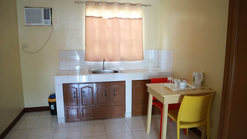 Imagen de la habitación del Hotel Danel Pensionne House. Foto 11