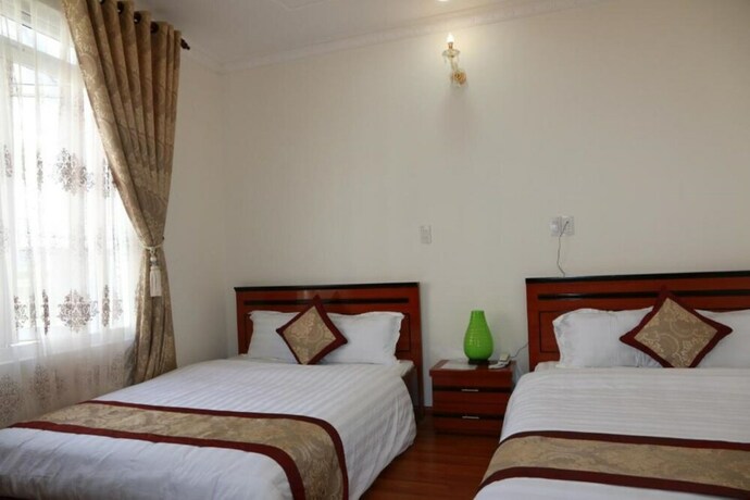 Imagen de la habitación del Hotel Dang Uyen. Foto 30