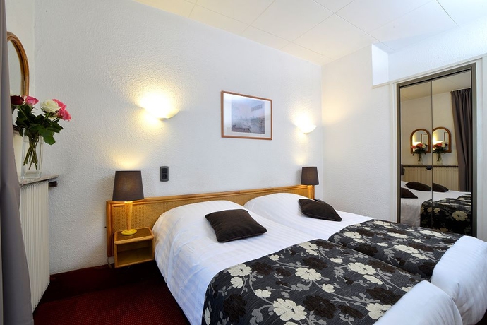 Imagen de la habitación del Hotel D'angleterre Grenoble Hyper-centre. Foto 7