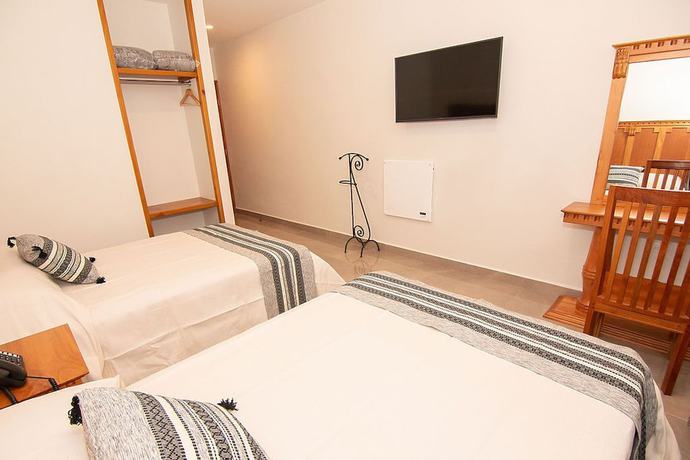 Imagen de la habitación del Hotel Danini. Foto 12