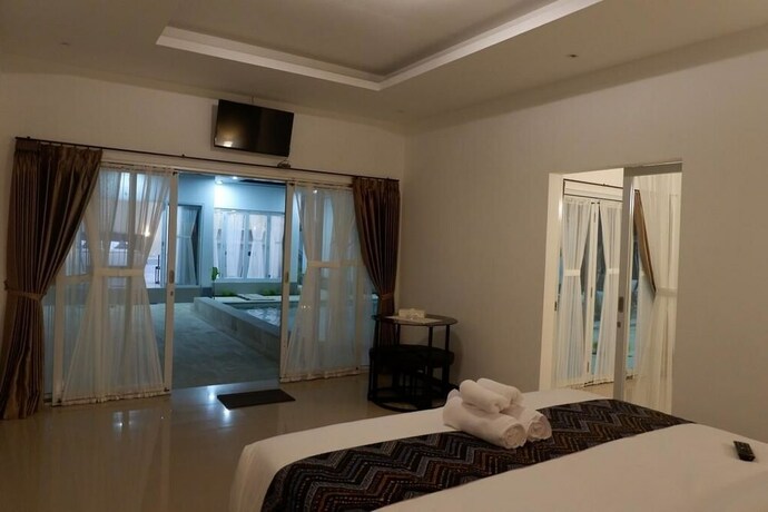 Imagen de la habitación del Hotel Daniswara Villa. Foto 20