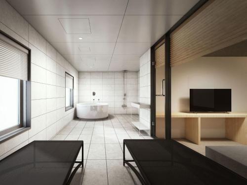 Imagen de la habitación del Hotel Dansetsu Sapporo. Foto 14