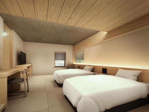 Imagen de la habitación del Hotel Dansetsu Sapporo. Foto 15