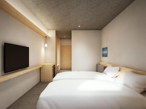Imagen de la habitación del Hotel Dansetsu Sapporo. Foto 17