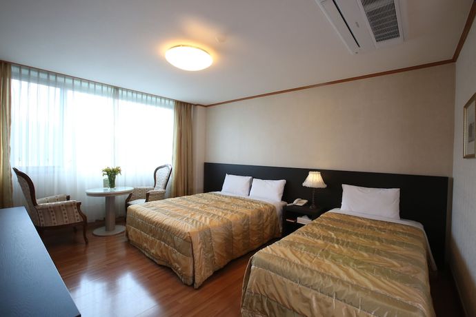 Imagen de la habitación del Hotel Danyang Tourist Hotel Edelweiss. Foto 11
