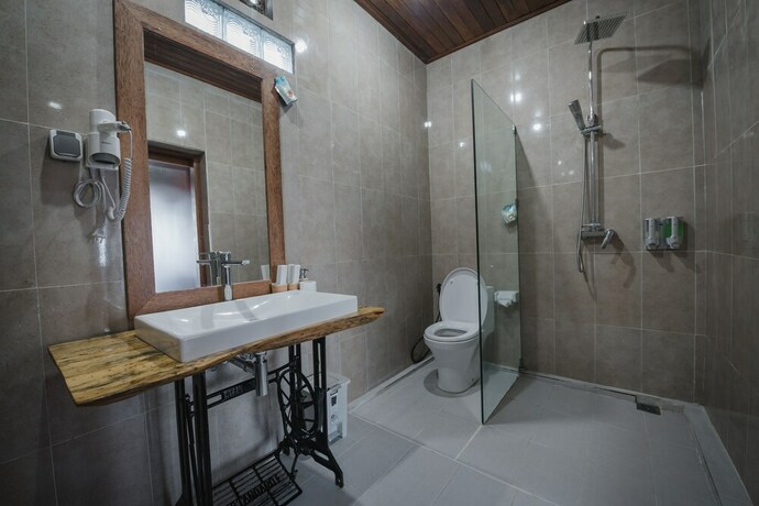 Imagen de la habitación del Hotel Daphila Cottage. Foto 19