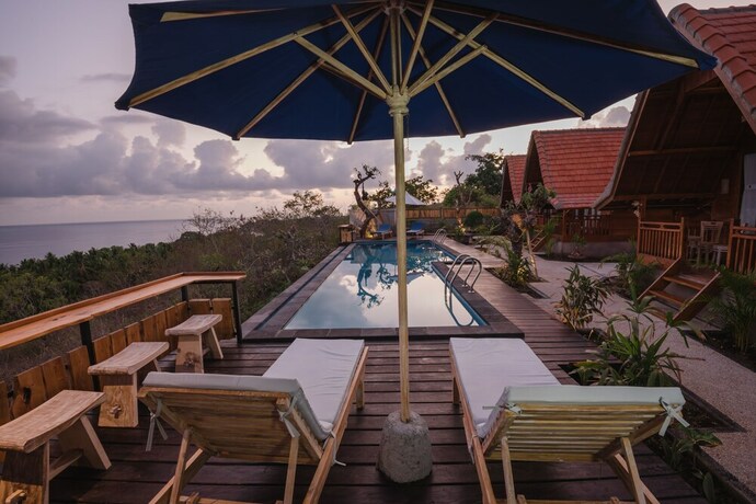 Imagen de la piscina del Hotel Daphila Cottage. Foto 34