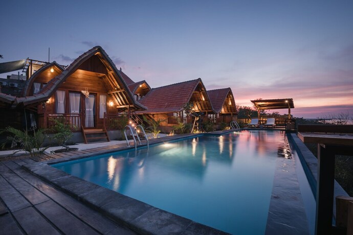 Imagen de la piscina del Hotel Daphila Cottage. Foto 35