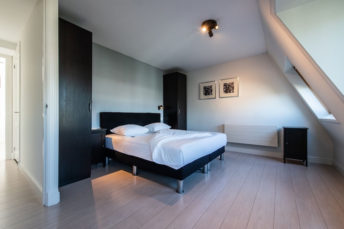 Imagen de la habitación del Hotel Dapper Market Apartment Suites. Foto 2