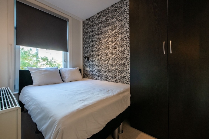 Imagen de la habitación del Hotel Dapper Market Apartment Suites. Foto 4