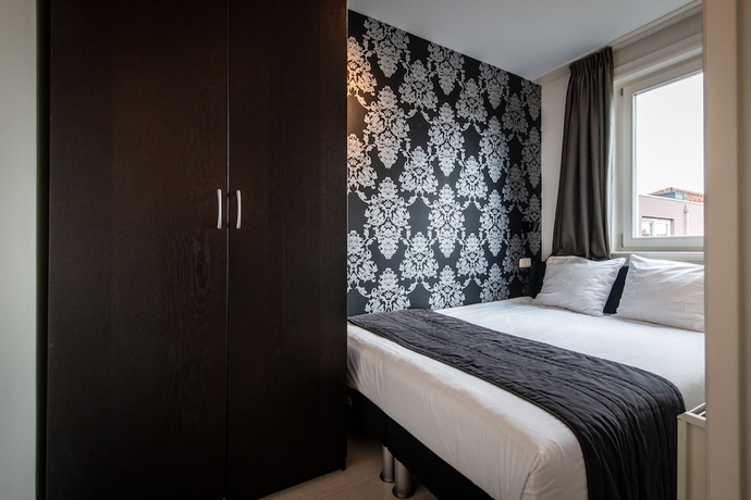 Imagen de la habitación del Hotel Dapper Market Apartment Suites. Foto 6