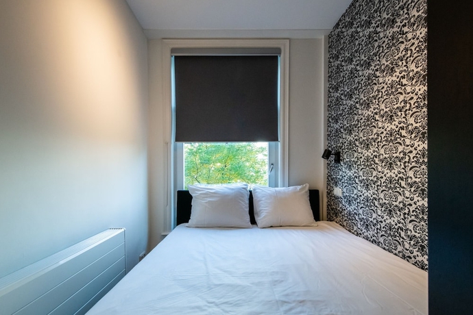 Imagen de la habitación del Hotel Dapper Market Apartment Suites. Foto 7