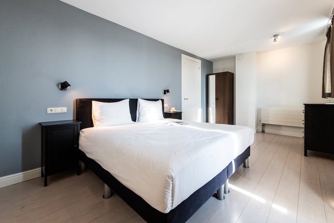 Imagen de la habitación del Hotel Dapper Market Apartment Suites. Foto 9