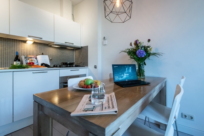 Imagen de la habitación del Hotel Dapper Market Apartment Suites. Foto 12