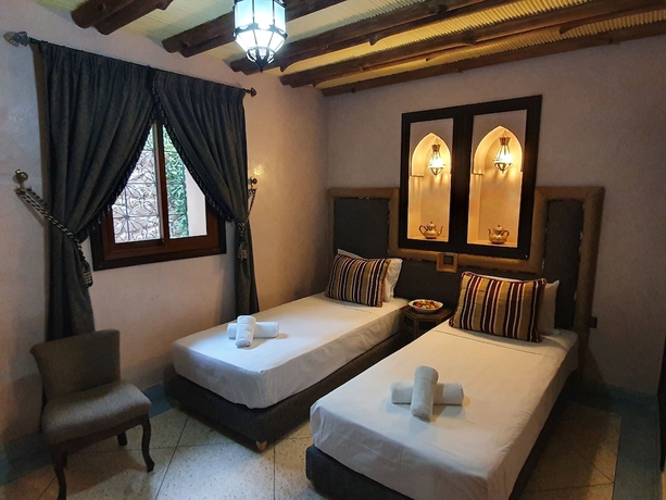 Imagen de la habitación del Hotel Dar Assarou. Foto 19