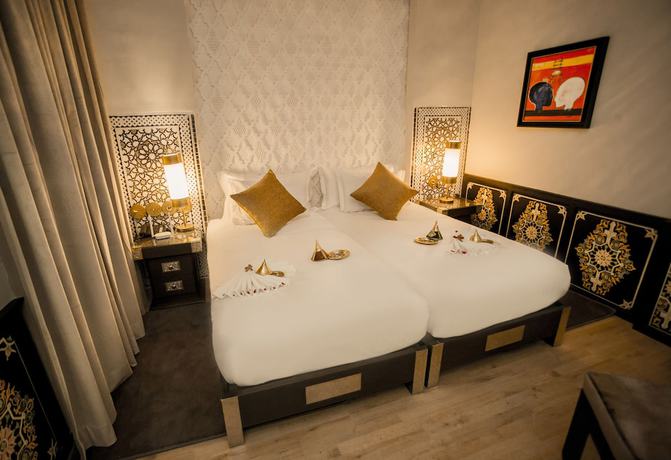 Imagen de la habitación del Hotel Dar Si Aissa All Suites Palace. Foto 17