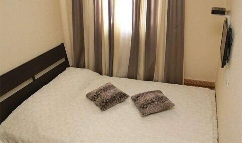 Imagen de la habitación del Hotel DarSiti. Foto 16