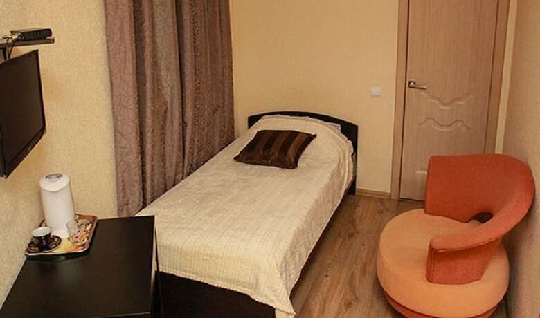 Imagen de la habitación del Hotel DarSiti. Foto 19