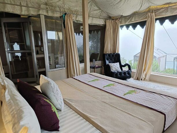 Imagen de la habitación del Hotel Darbar - A Heritage Farmstay. Foto 19