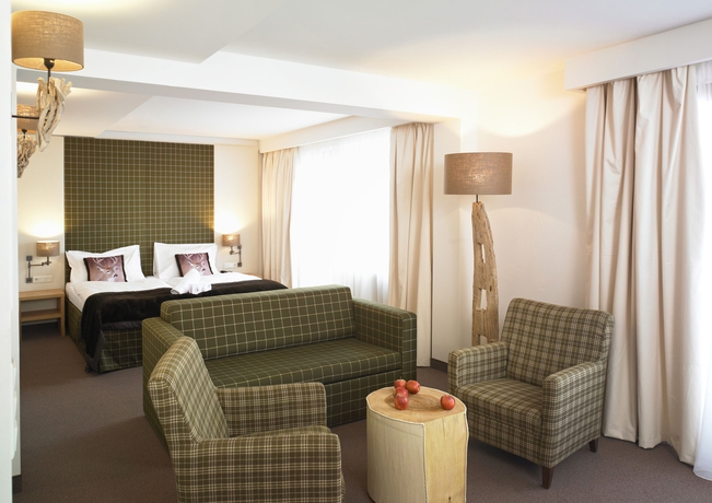 Imagen de la habitación del Hotel Das Alpenhaus Kaprun. Foto 9