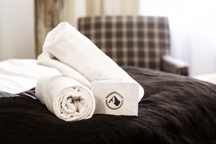 Imagen de la habitación del Hotel Das Alpenhaus Kaprun. Foto 12