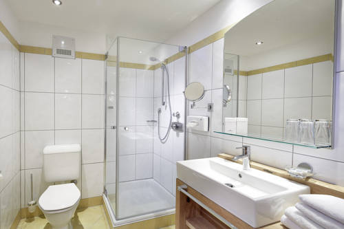 Imagen de la habitación del Hotel Das Alpenwelt Resort. Foto 4