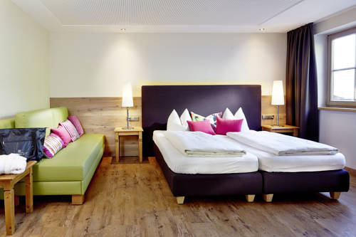 Imagen de la habitación del Hotel Das Alpenwelt Resort. Foto 6