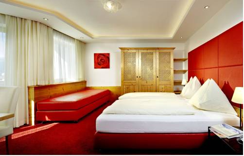 Imagen de la habitación del Hotel Das Alpenwelt Resort. Foto 7