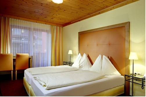 Imagen de la habitación del Hotel Das Alpenwelt Resort. Foto 10