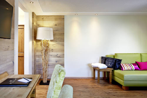 Imagen de la habitación del Hotel Das Alpenwelt Resort. Foto 11