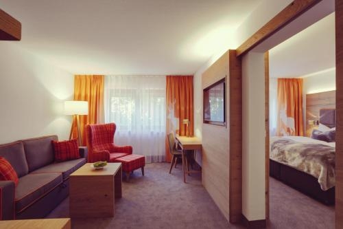 Imagen de la habitación del Hotel Das Aunhamer Suite & Spa Hotel. Foto 9