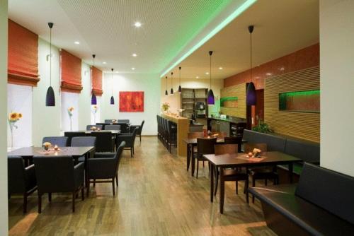 Imagen del bar/restaurante del Hotel Das Bischof. Foto 2