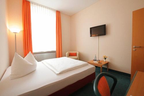 Imagen de la habitación del Hotel Das Bischof. Foto 3