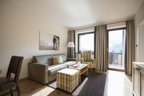 Imagen de la habitación del Hotel Das Grafenstein Familienresidence. Foto 9