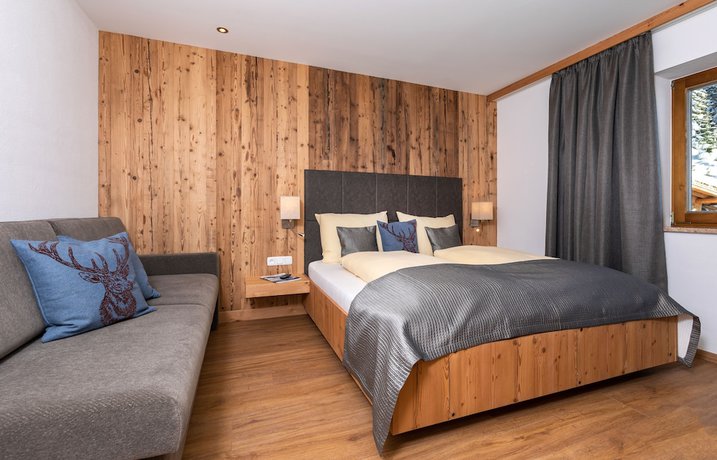 Imagen de la habitación del Hotel Das Grünholz Aparthotel. Foto 8