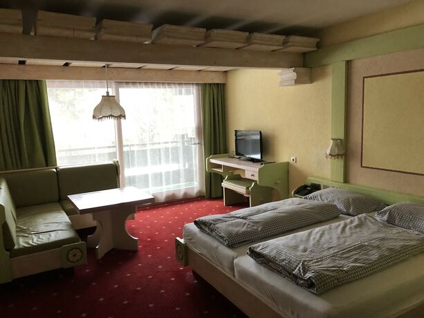 Imagen de la habitación del Hotel Das Kronenhotel. Foto 12