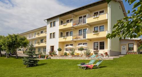 Imagen de la habitación del Hotel Das Mittelpunkt. Foto 2