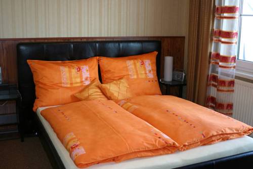 Imagen de la habitación del Hotel Das Mittelpunkt. Foto 3