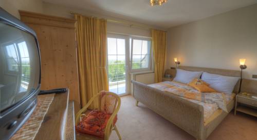 Imagen de la habitación del Hotel Das Mittelpunkt. Foto 10