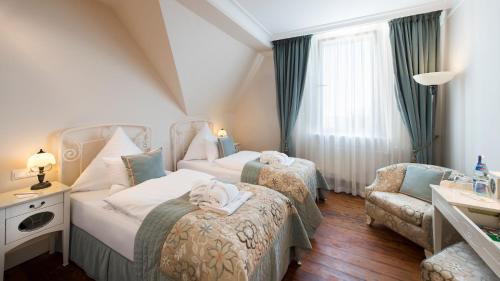 Imagen de la habitación del Hotel Das Palmenwald Schwarzwaldhof, Bw Signature Collection. Foto 9