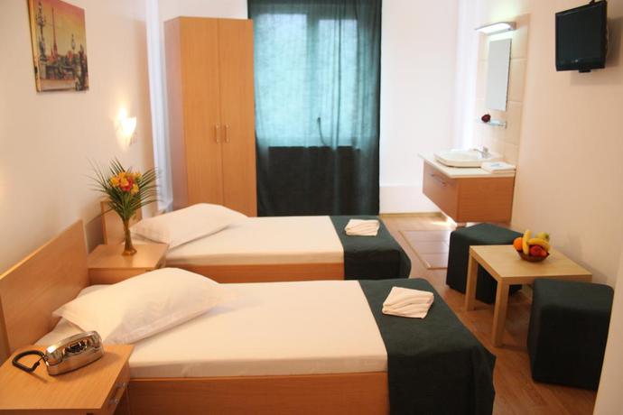 Imagen de la habitación del Hotel Das President Hotel. Foto 4