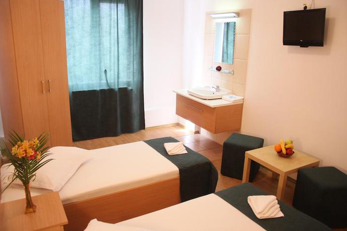 Imagen de la habitación del Hotel Das President Hotel. Foto 6